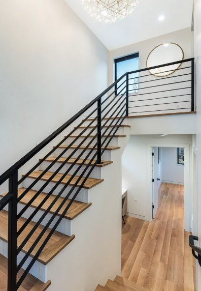 Stair with black steel railing