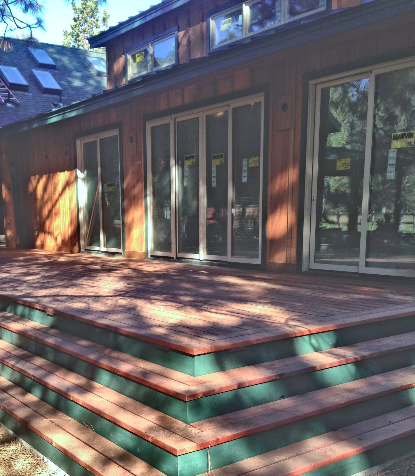 Wraparound wood deck with stepped edges