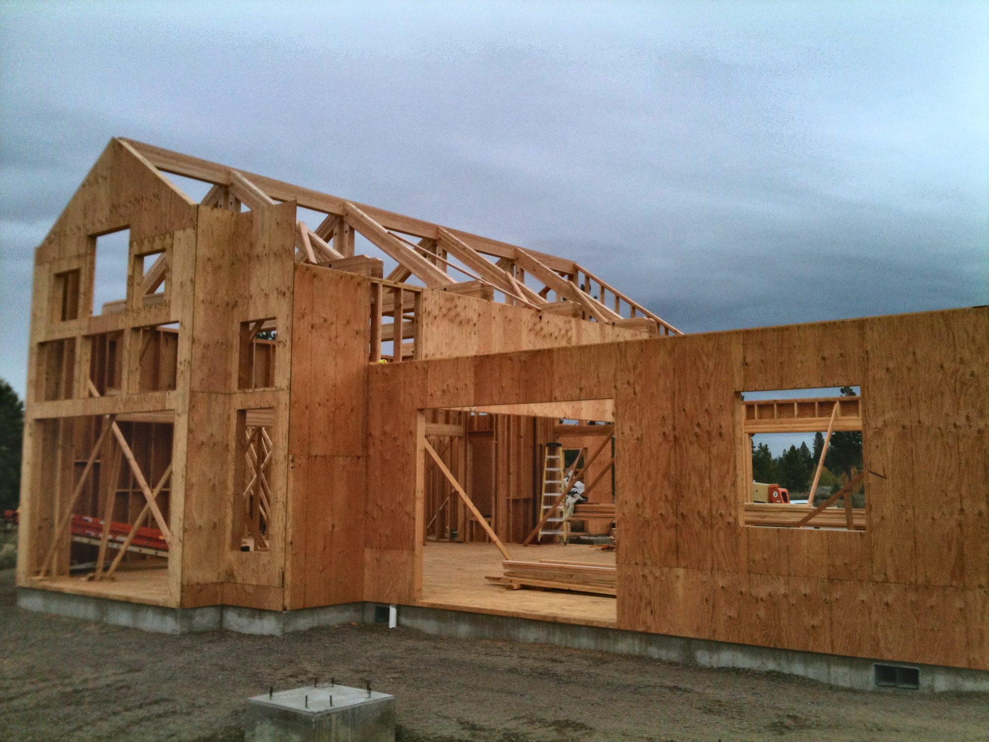 New home framed and sheathed, roof trusses set